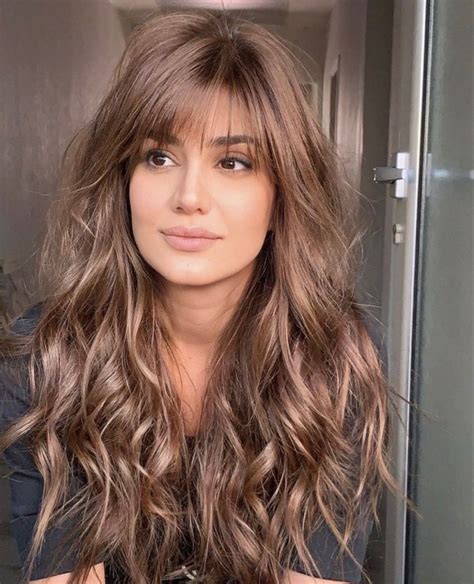 long brown hair with long bangs|More.